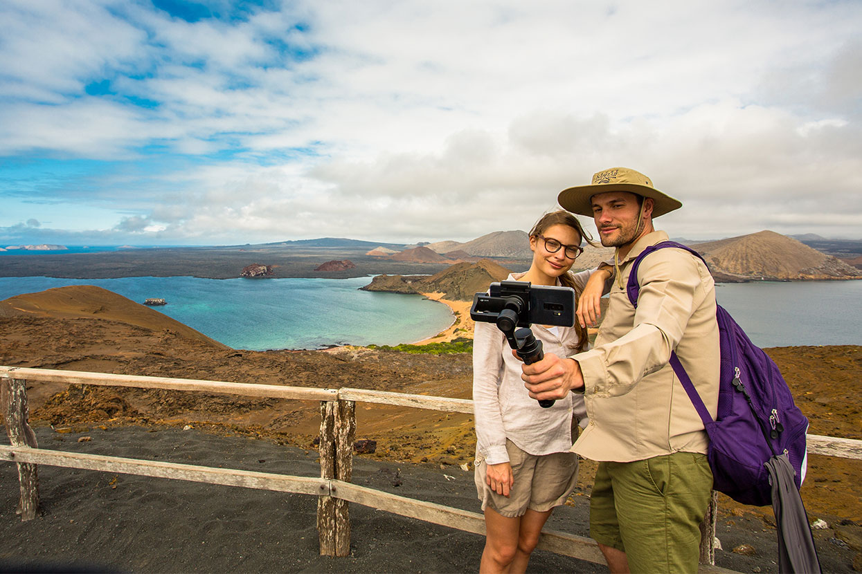 Couple taking a selfie on Bartolome Island